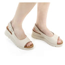 Sandalo con zeppa in pelle