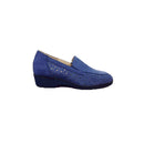 Mocassino con zeppa traforato in pelle