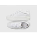 Th feminine elevated leather sneaker