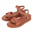 Sandalo con zeppa in pelle