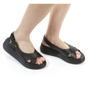 Sandalo con zeppa in pelle