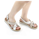 Sandalo con zeppa in pelle