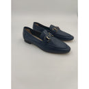 Mocassino in pelle con morsetto in tinta