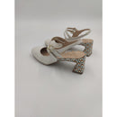 Slingback in vernice con tacco