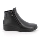 Stivaletti neri con zeppa in pelle da donna