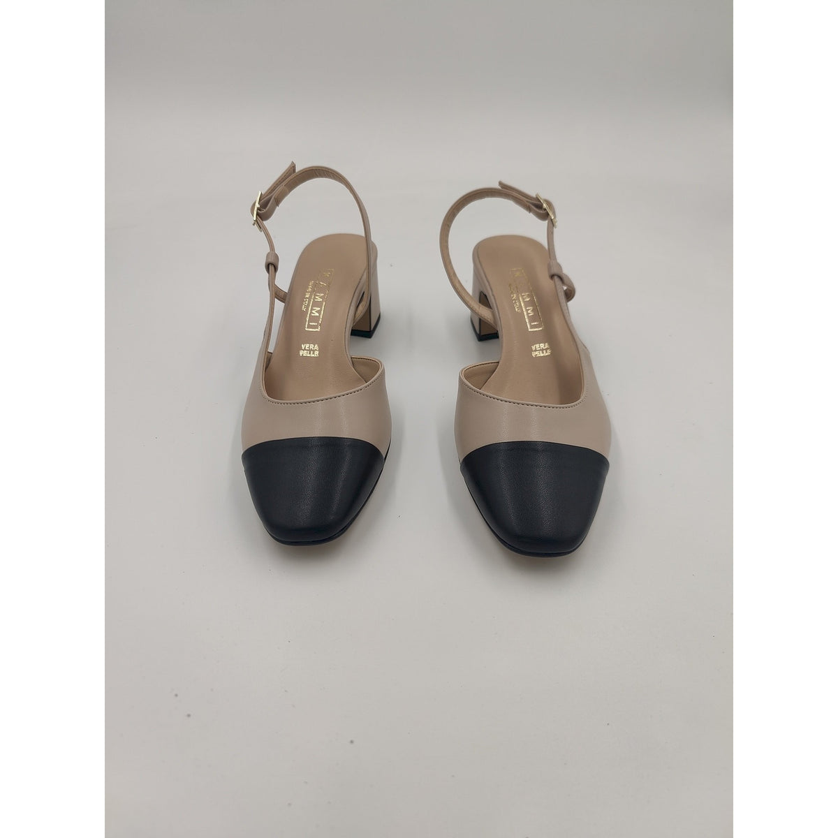 Sling back con puntale e tacco