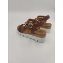 Sandalo con zeppa in pelle