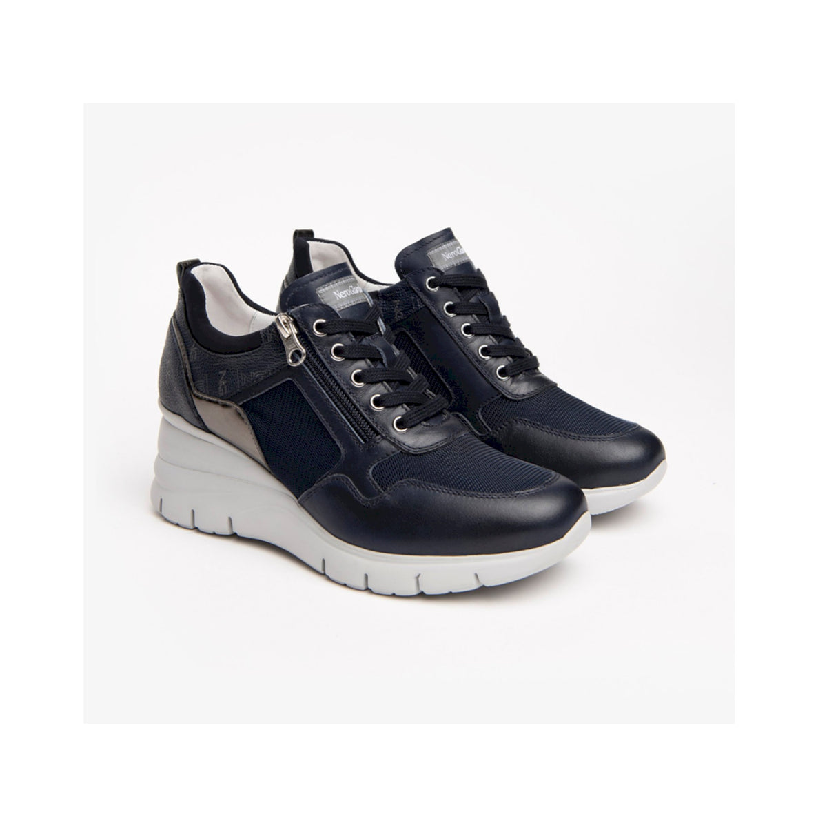 Sneaker donna in pelle con zeppa